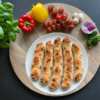 Fünf goldbraun gebackene Pizzastangen